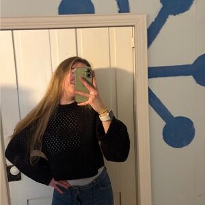 divided black sweater